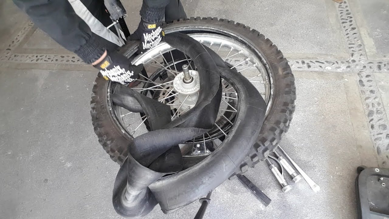CAMBIO DE LLANTA MOTOparche
